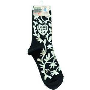 black with white floral socks, white heart reads "i made a good kid"