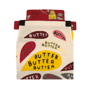 off-white/beige apron with large multicolored speech bubbles "butter butter butter"