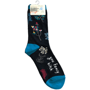 black socks with blue toe and heel, floral pattern text reads "you fancy bitch"