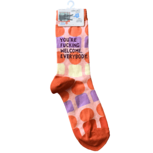 orange, pink and purple socks that read "you're fucking welcome everybody"