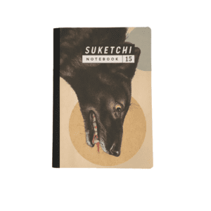 notebook with wolf face image