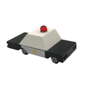 black and white wooden toy police car