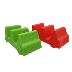 Two plastic taco holders shaped like trucks, one red and one green.