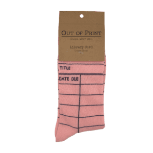 A pair of pink socks with an old library card template printed on them.